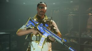 An in-game recreation of Snoop Dogg in a white shirt with gold floral print and a blue rifle with gold engravings of marijuana plants and his name