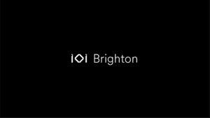 A black image with the IOI logo and Brighton next to it