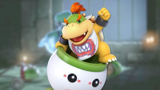 Personagem de Mario, Bowser Jr, uma pequena tartaruga com um olhar feroz em um hovercraft com uma carinha sorridente.  Ele também está usando um babador com dentes desenhados