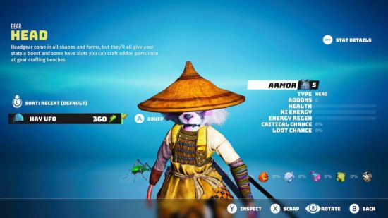 Análise do Biomutant Switch: uma captura de tela do equipamento do personagem mostrando o rótulo orientalista ‘hay UFO’ para um chapéu de hambúrguer de arroz