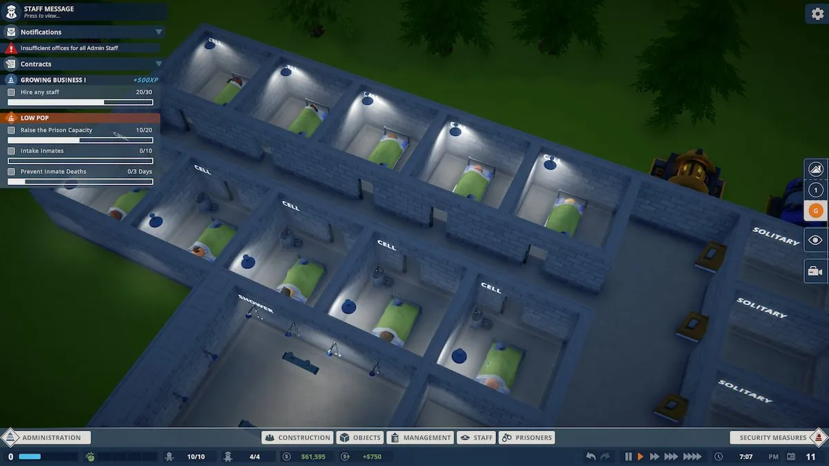 Um bloco de celas construído por um jogador em Prison Architect 2.