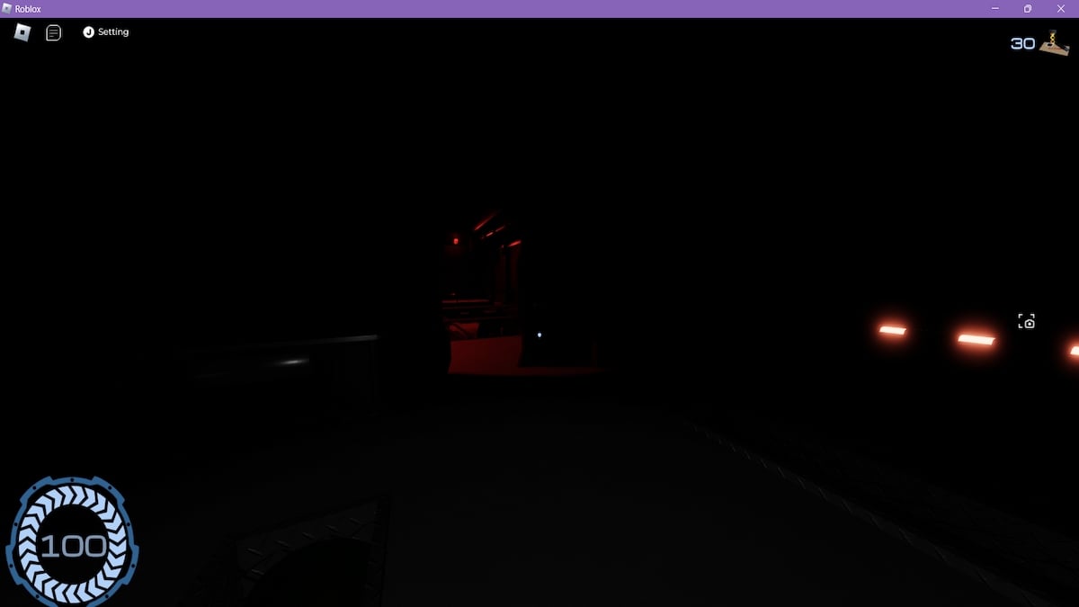 A sala de uma base inundada de luz vermelha em Pressure no Roblox.