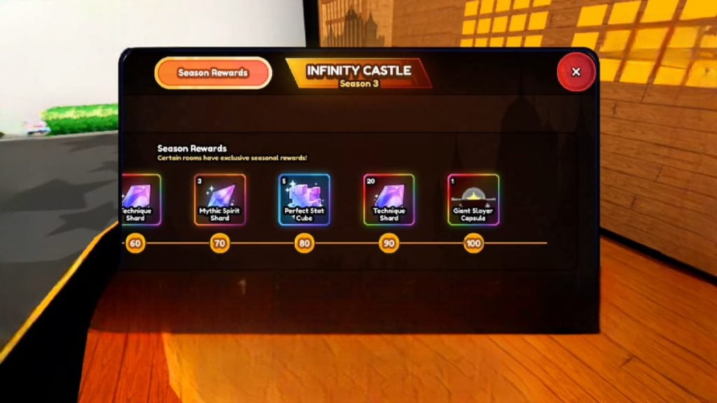 Uma captura de tela da experiência Roblox 'Anime Last Stand' apresentando a interface Season Rewards para Infinity Castle, Temporada 3. A exibição de recompensas inclui cinco itens com seus respectivos níveis de desbloqueio: Exchange Shard no nível 60, Mythic Spirit Sword no nível 70, Perfect State Capsule no nível 80, Technique Shard no nível 90 e Giant Slayer Capsule no nível 100. Cada item é representado por um ícone dentro de uma moldura hexagonal contra um fundo escuro com um contorno brilhante. Ao fundo, vislumbra-se uma cena de rua urbana com prédios e um céu laranja.