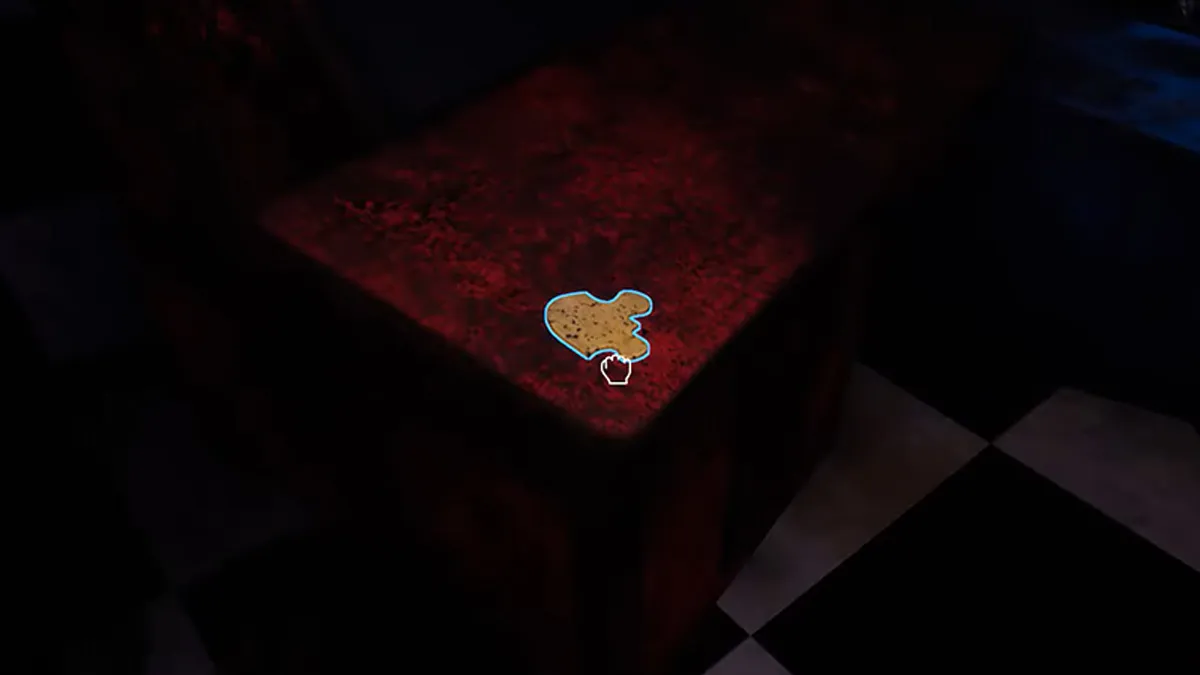 Uma peça do quebra-cabeça em uma mesa em FNAF Help Wanted 2.