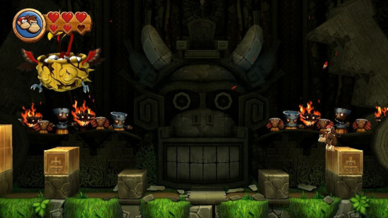 Captura de tela da análise HD de Donkey Kong Country Returns mostrando uma batalha contra um chefe